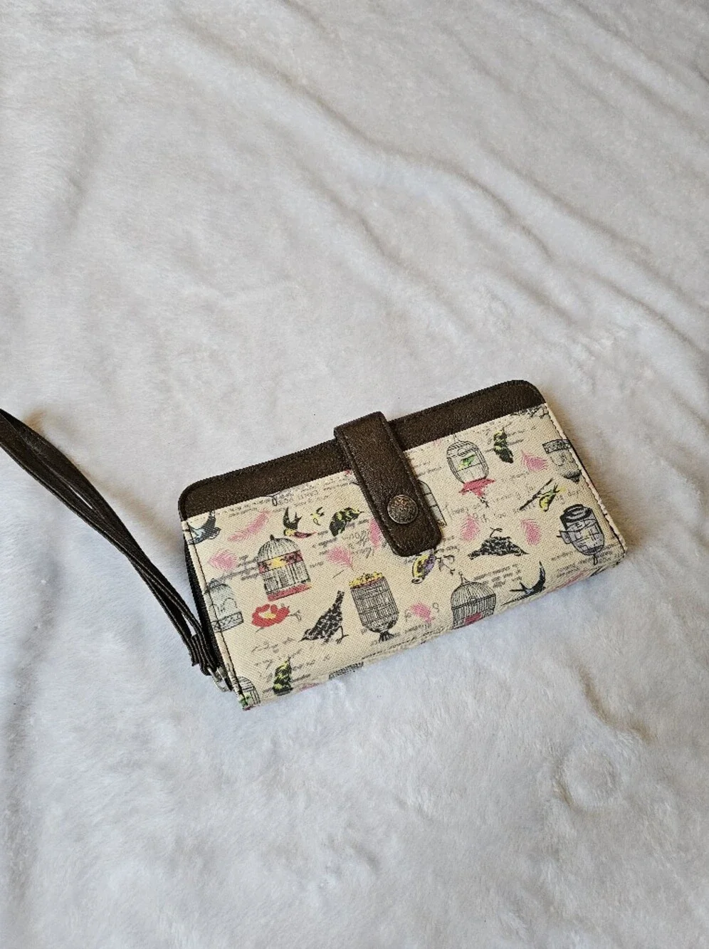 Relic Beige Canvas Wristlet Clutch with Brown Trim and Birdcage Print